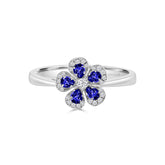 CHAMOMILE RING IN 18K WHITE GOLD – BLUE SAPPHIRE AND DIAMOND FLORAL DESIGN