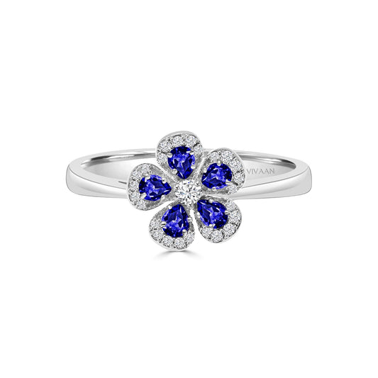 CHAMOMILE RING IN 18K WHITE GOLD – BLUE SAPPHIRE AND DIAMOND FLORAL DESIGN