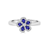 CHAMOMILE RING IN 18K WHITE GOLD – BLUE SAPPHIRE AND DIAMOND FLORAL DESIGN