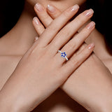 CHAMOMILE RING IN 18K WHITE GOLD – BLUE SAPPHIRE AND DIAMOND FLORAL DESIGN